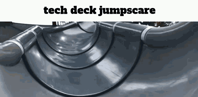 a slide with the words tech deck jumpscare written above it