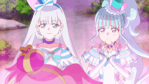 two anime girls are standing next to each other with their hands together