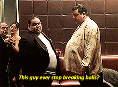 a group of men are standing in a room and one of them is asking if this guy ever stopped breaking balls