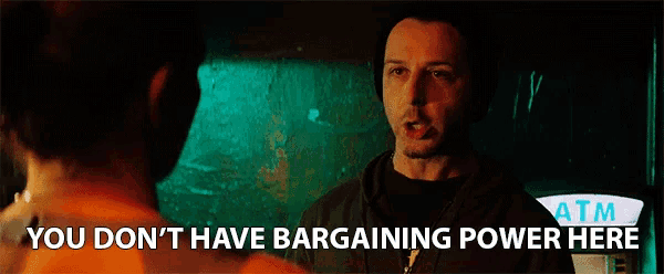 a man talking to another man with the words " you don 't have bargaining power here " above him