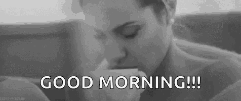 a black and white photo of a woman drinking from a cup with the words `` good morning '' .
