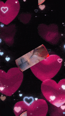 a picture of a person surrounded by pink hearts on a black background