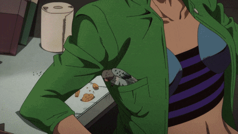 a woman in a green jacket is holding a spoon in her pocket