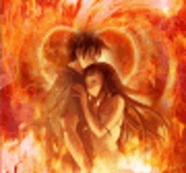 a man and a woman are standing in front of a heart shaped fire .