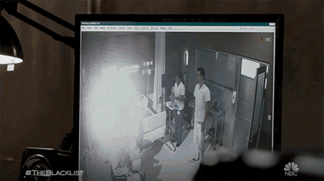 a computer screen shows a hospital room and the words " the blacklist " on the bottom