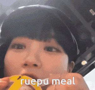 a close up of a person 's face with the words ruepu meal on the bottom