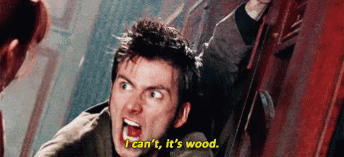 a man is screaming and saying `` i can 't , it 's wood '' .