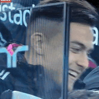 a close up of a man 's face behind a screen that says first star