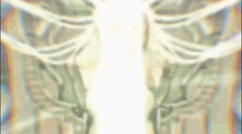 a blurry picture of a person 's skeleton with a white light coming out of it