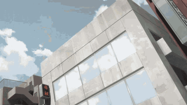 a building with a sign on the side that says ' aoyama '