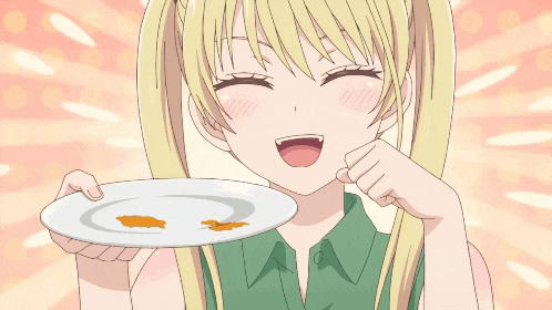 a girl with blonde hair is holding a plate with sauce on it and smiling