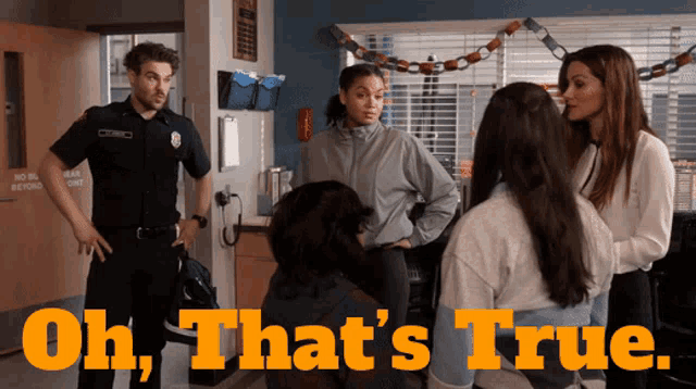 a group of people are standing in a room with the text oh that 's true