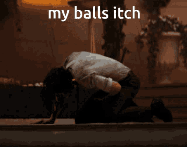 a man kneeling down with the words my balls itch written on the bottom