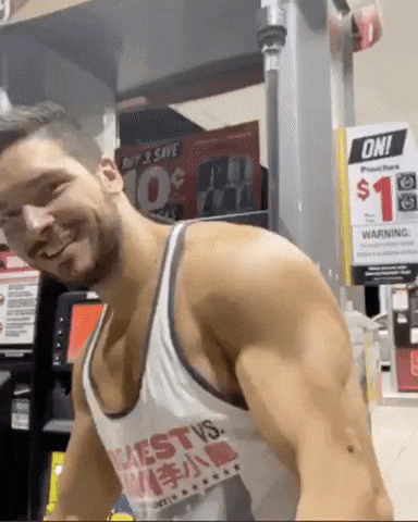 a man is wearing a tank top that says chest vs. on it