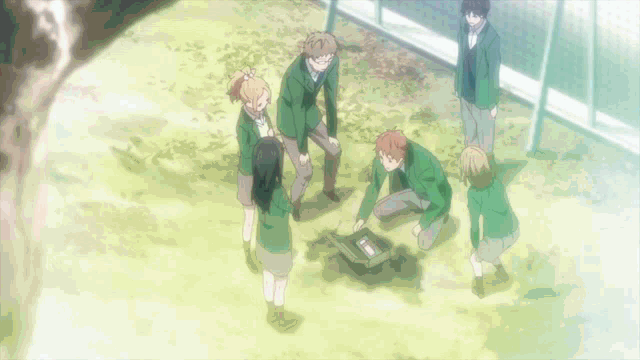 three anime characters are standing next to each other and one of them is holding a heart shaped object