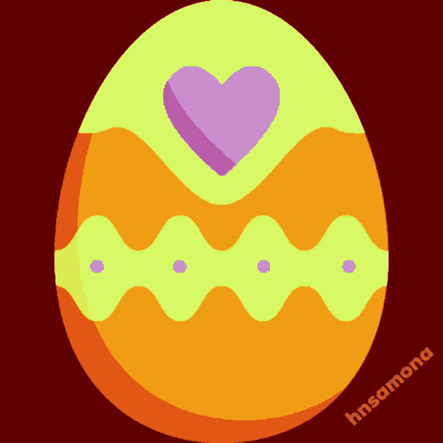 a yellow and orange easter egg with a purple heart in the center