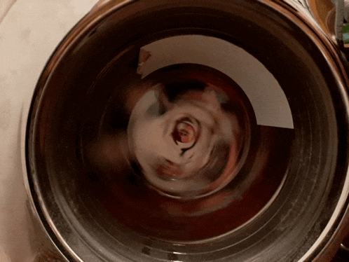 a close up of the inside of a washing machine with a circular pattern