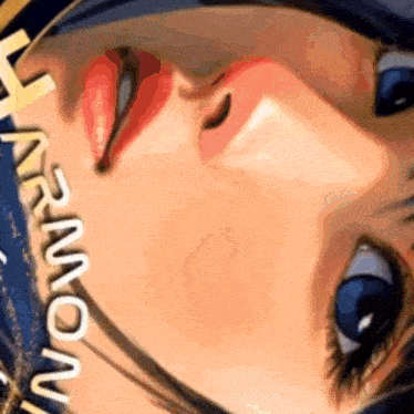 a close up of a woman 's face with red lips and blue eyes