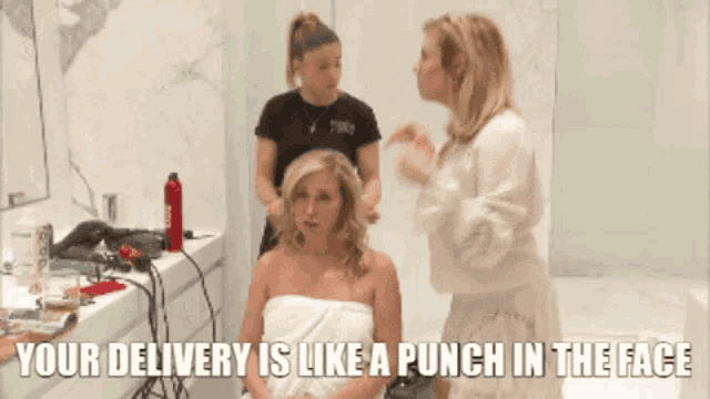 a woman wrapped in a towel is getting her hair done with the caption " your delivery is like a punch in the face " below her