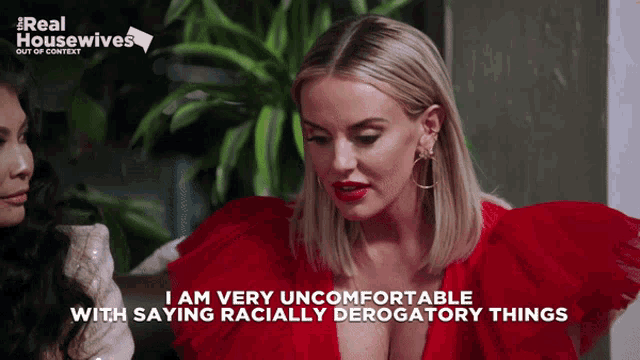 a woman in a red dress says " i am very uncomfortable with saying racially derogatory things "