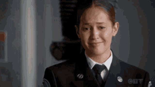 a woman in a military uniform with a badge that says ctv
