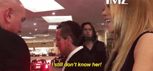 a man and a woman are talking to each other and the woman is saying `` i still don 't know her '' .