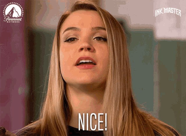 a woman says nice in front of a paramount logo