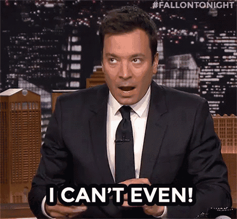 a man in a suit and tie is saying " i can 't even "