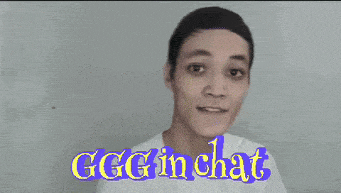 a man in a white shirt with ggg in chat written on it