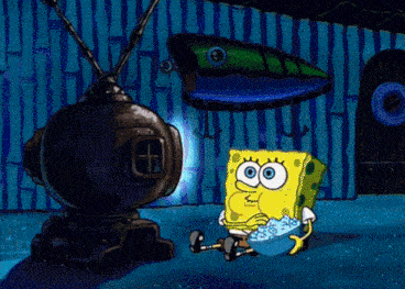 a cartoon of spongebob sitting in front of a television eating popcorn