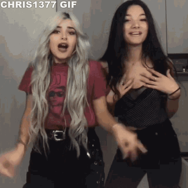 a chris1377 gif of two women dancing together