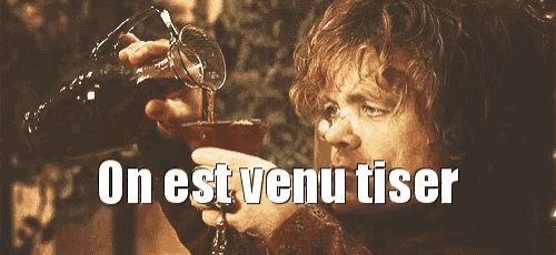 a man is pouring a drink into a glass with the words on est venu tiser written below him