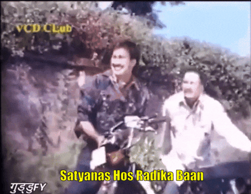 two men are riding motorcycles with the words satyanas hos radika baan on the bottom