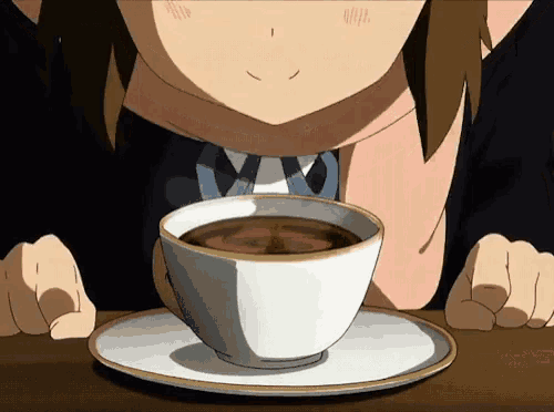 a cartoon character smelling a cup of coffee