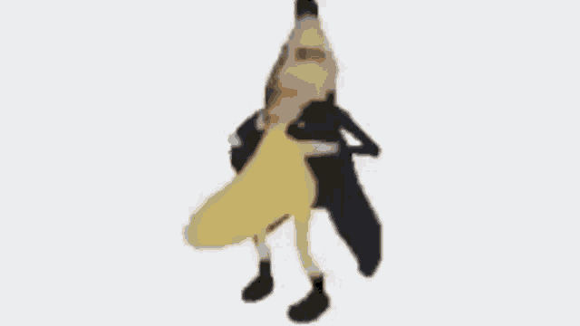 a banana with a man 's head and arms is dancing .