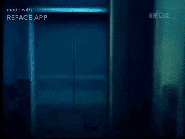 a nurse is standing in a hallway with the words made with reface app below her