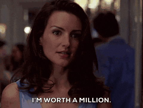 a woman says " i 'm worth a million " while looking at the camera