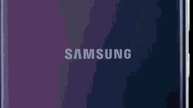 the back of a samsung phone with a blue and purple background