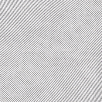a yellow red and blue object is floating in the air on a striped background .