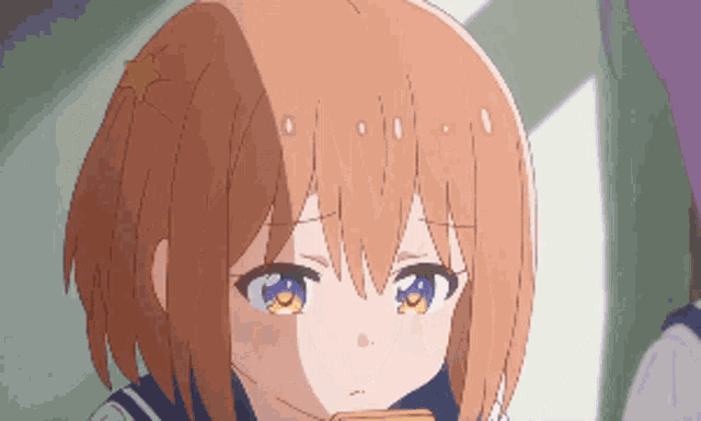 a cartoon girl with brown hair and blue eyes
