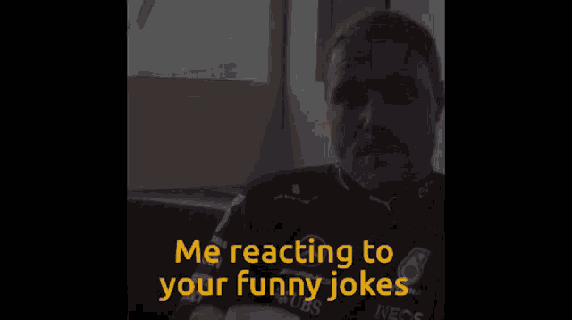 a man holding a cell phone with the words " me reacting to your funny jokes " below him