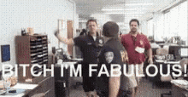 a group of police officers are standing in an office with the words `` bitch i 'm fabulous '' written above them .