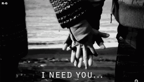 a black and white photo of a man and woman holding hands with the words i need you below them