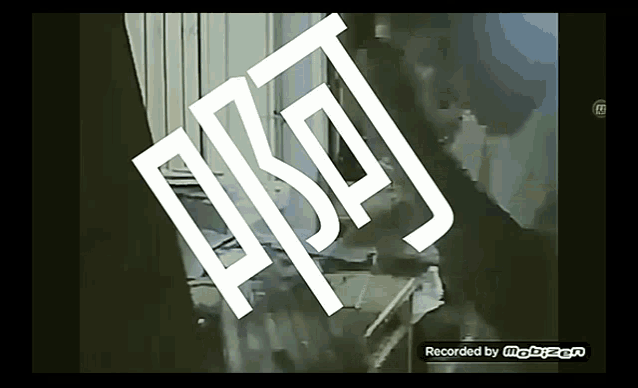 a video is being recorded by mobizen and shows a person smoking a cigarette