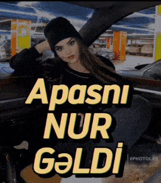 a woman is sitting in a car with the words apasni nur geldig