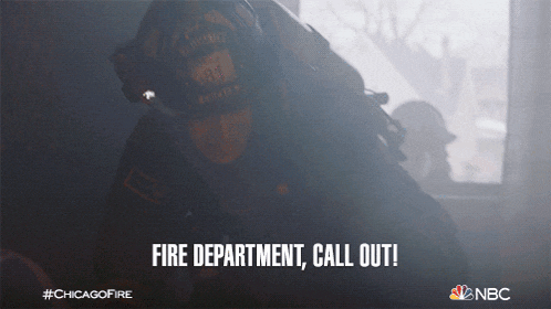 a fire department call out sign with a fireman in a helmet