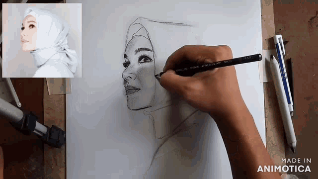 a person is drawing a woman 's face with a pencil on a piece of paper that says made in animotica