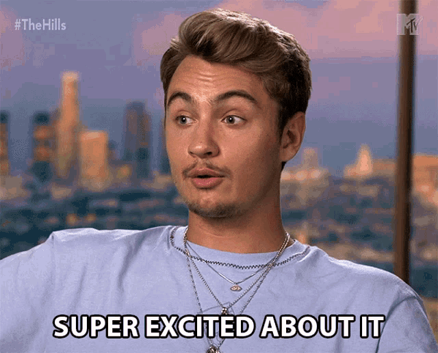 a man says super excited about it in front of a city