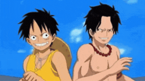a man is holding a fist in the air while another man is holding a fireball