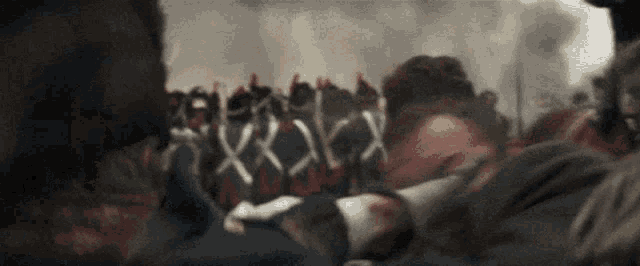 a group of soldiers are standing in a line with the letters x and y visible